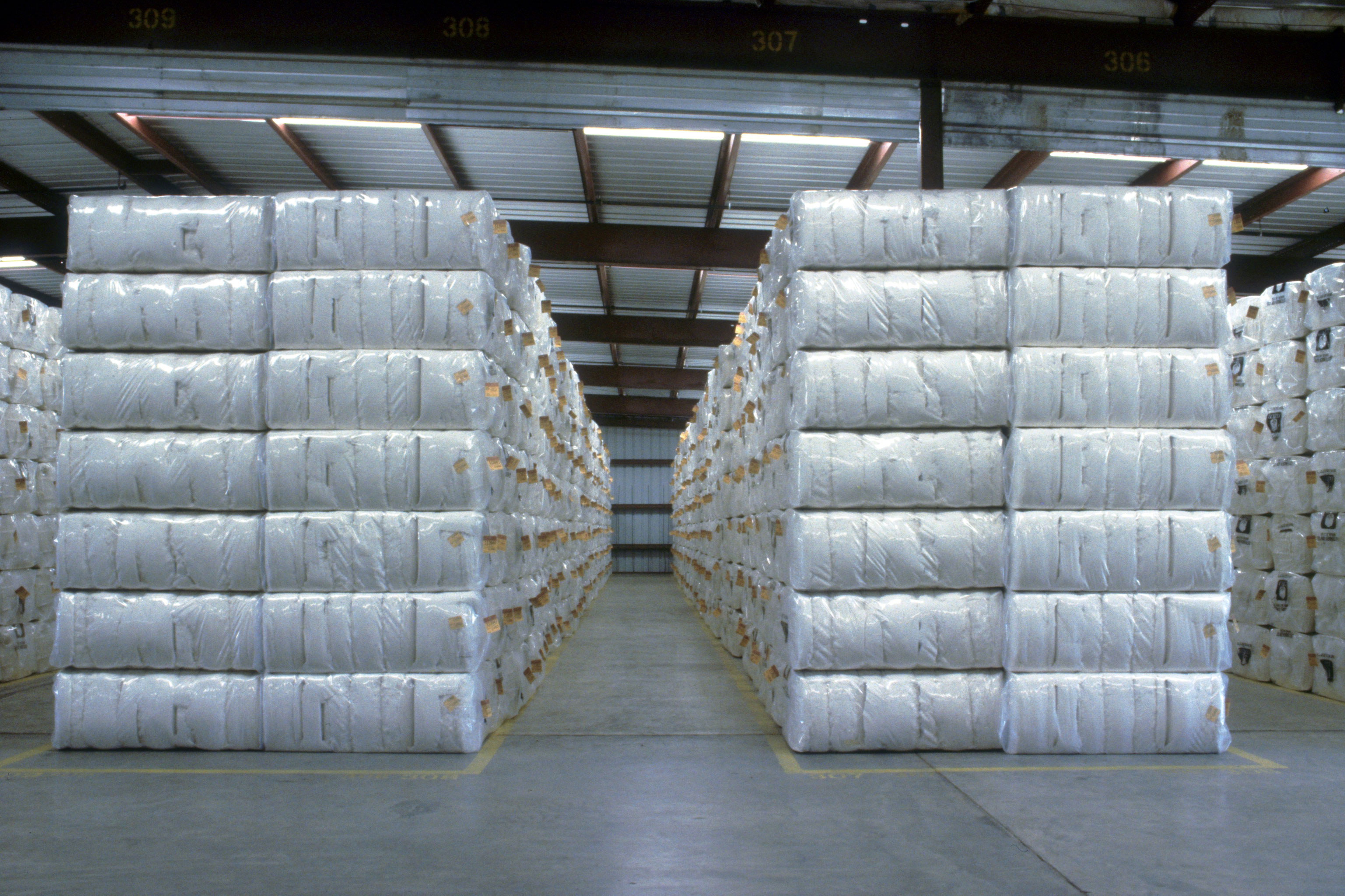 Bales of cotton in a warehouse