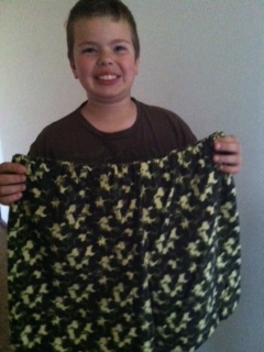 Teigen and the cotton shorts he made for this year's 4-H project