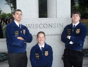 Official Dress: A group of my FFA friends went to the Washington Leadership Conference. Here we are siting in front of Wisconsin at the World War 2 memorial. By the way, those blue jackets are made out of cotton.