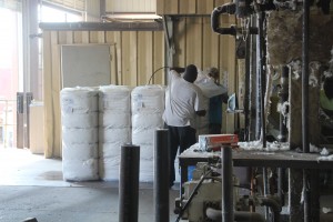 bales of cotton at the gin